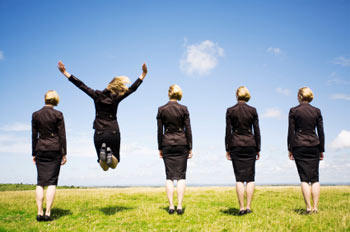 Business person jumping in excitement