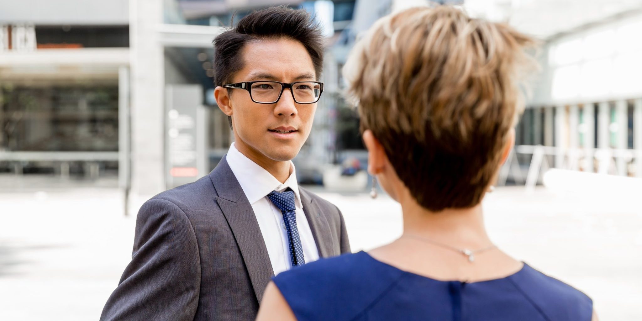 two-colleagues-walking-together-in-a-city-2024-10-11-14-27-38-utc hiring